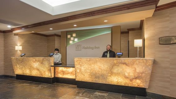 Our Modern Front Desk and Our Happy Staff